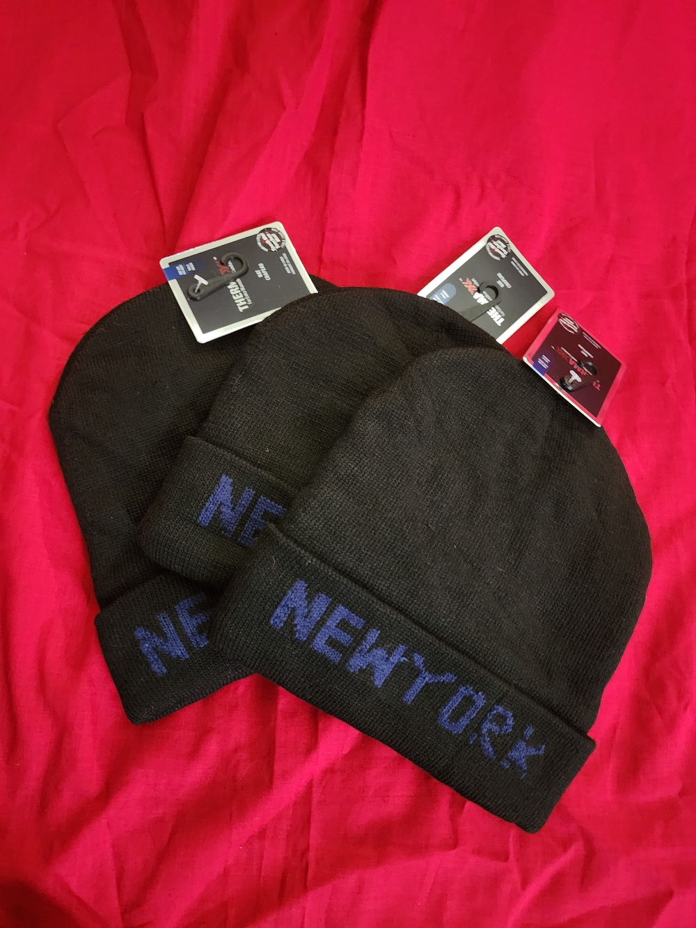 Black Knit Beanie with Blue Lettering
